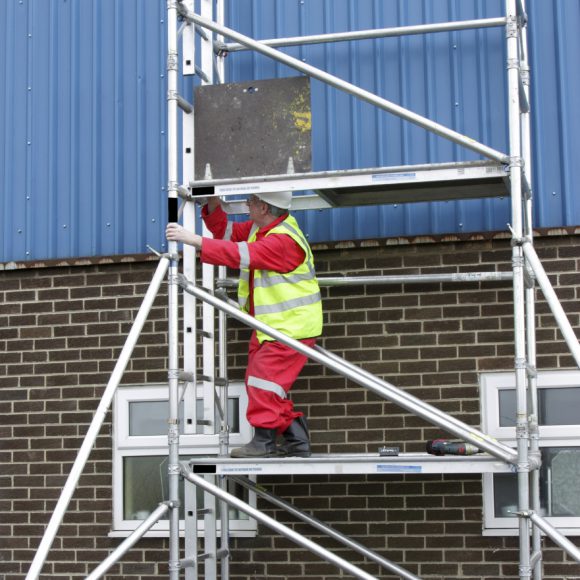 A man on scaffolding.