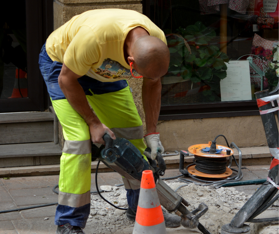 A man drilling.