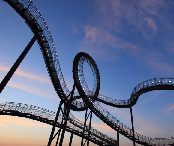 A black metal roller coaster.