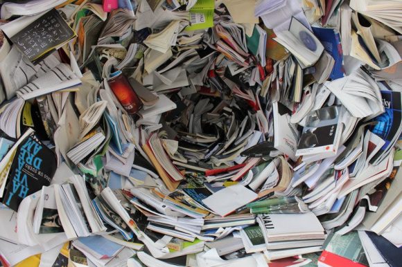 A swirling pile of books