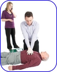 A man giving someone CPR while a female bystander calls for an ambulance.