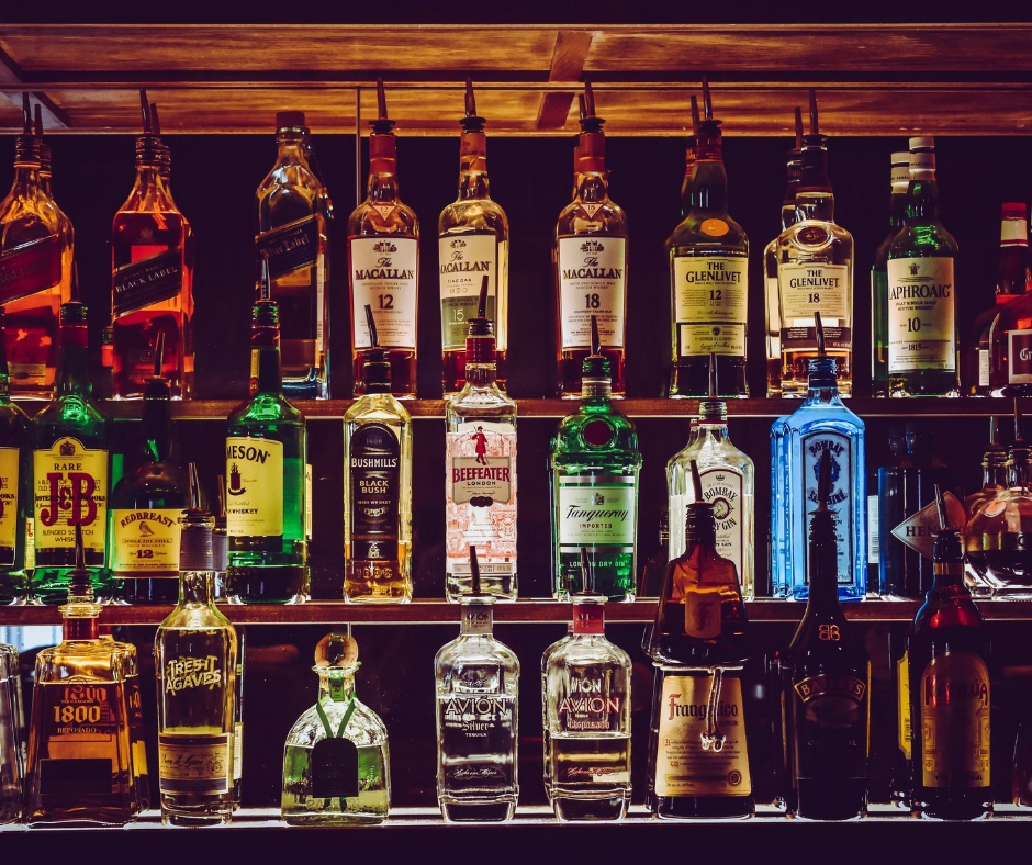 Shelves with various bottles of alcohol